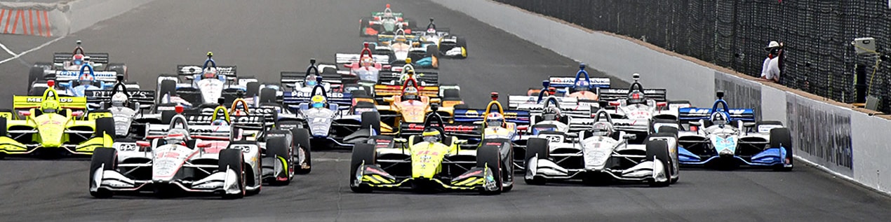 indy cars racing to through the start line Eugene