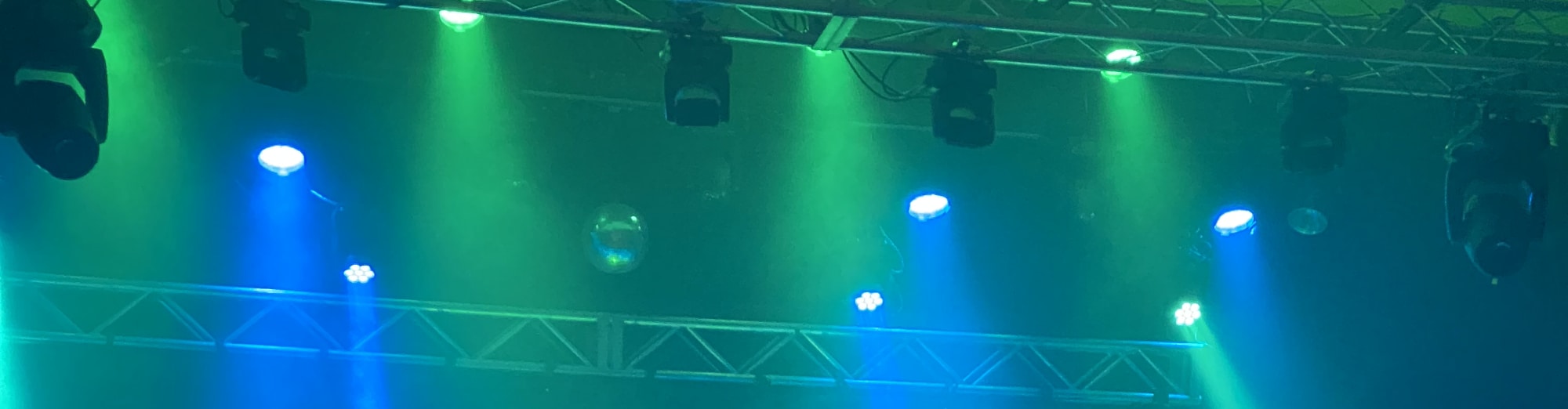 blue and green theater stage lights Eugene